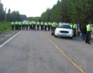 RCMP officers block Highway 126 in Kent County on June 5th. Shale gas protesters had gathered there to oppose shale gas exploration by SWN.  Photo by Roy MacMullin.