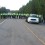 RCMP officers block Highway 126 in Kent County on June 5th. Shale gas protesters had gathered there to oppose shale gas exploration by SWN.  Photo by Roy MacMullin.