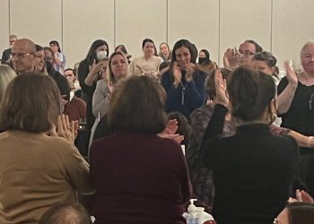 Angry overflow crowd confronts education minister over French immersion reforms [audio]