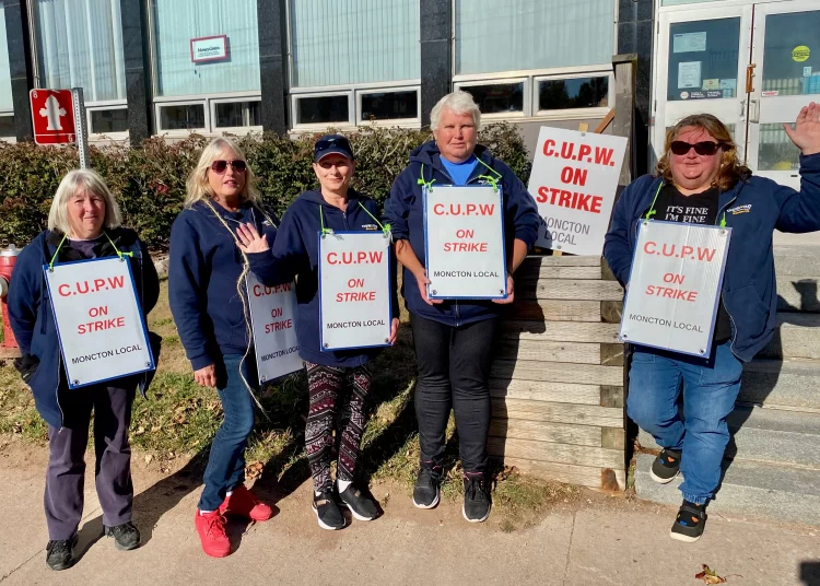 Postal workers picket in Sackville as rural post offices face uncertain future