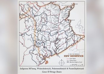 A historical map of New Brunswick titled "Indigenous Mi’kmaq, Wolastoqewiyik, Peskotomuhkatiyik & Panáwahpskewoyak Canoe & Portage Routes." The map displays a dense network of rivers (Canoe Routes in blue) and land trails (Portage Routes in red) across the province, with the Wolastoq (Saint John River) and its tributaries being prominent. It also shows Watershed Heights of Land.