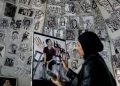 Displaced Gaza artist turns shelter into gallery of war